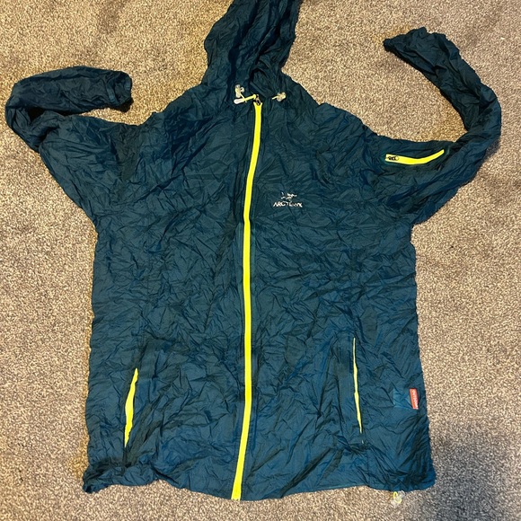 Arc'teryx Other - Arc'teryx Dark Blue Jacket with Bright Yellow Zipper